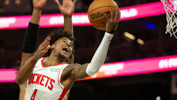 Rockets guard Jalen Green drives against Golden State Warriors forward Kevon Looney (5) during the third quarter at Chase Center.
